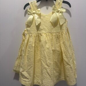 Girls Yellow Seersucker Sleeveless Dress with Bow Accents